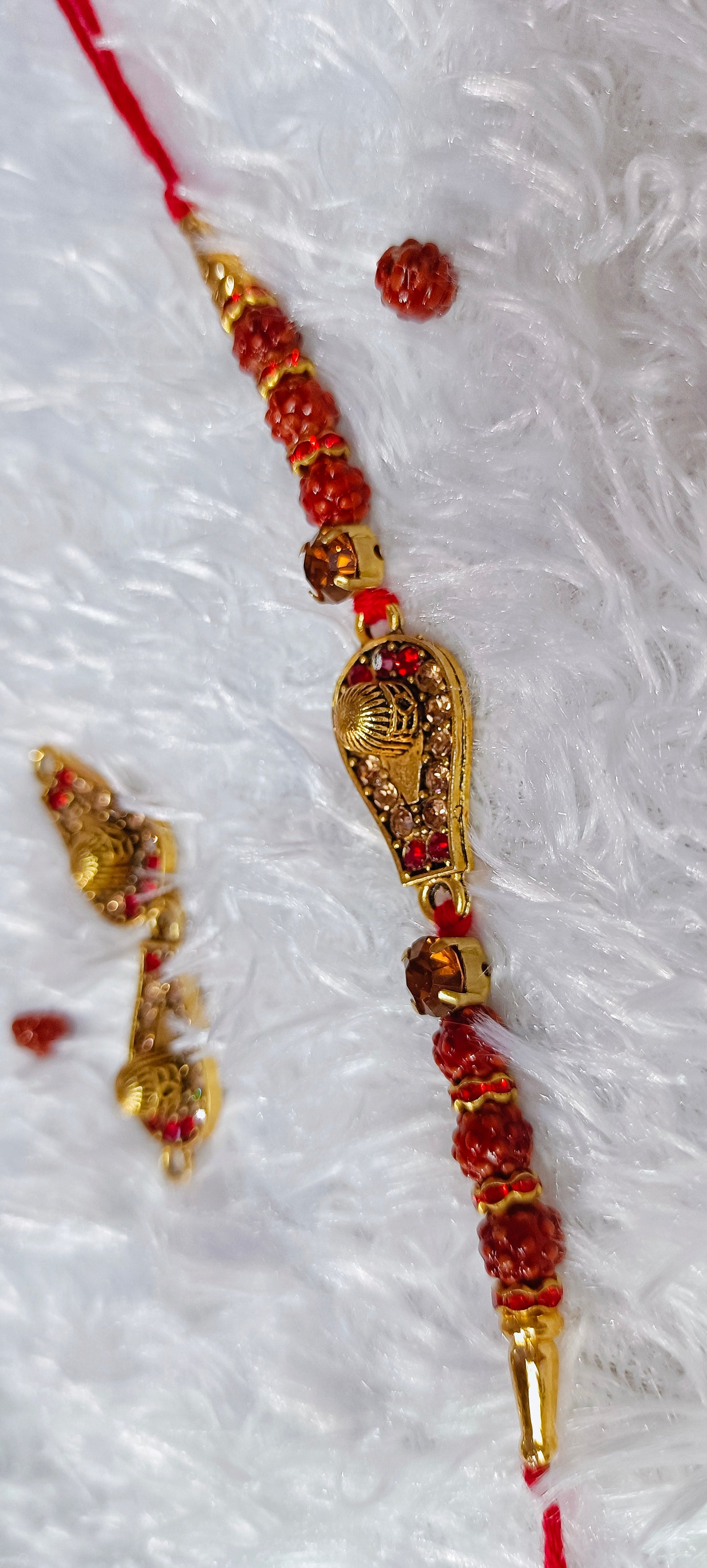 Rakhi beautiful shivling with red Ad stone