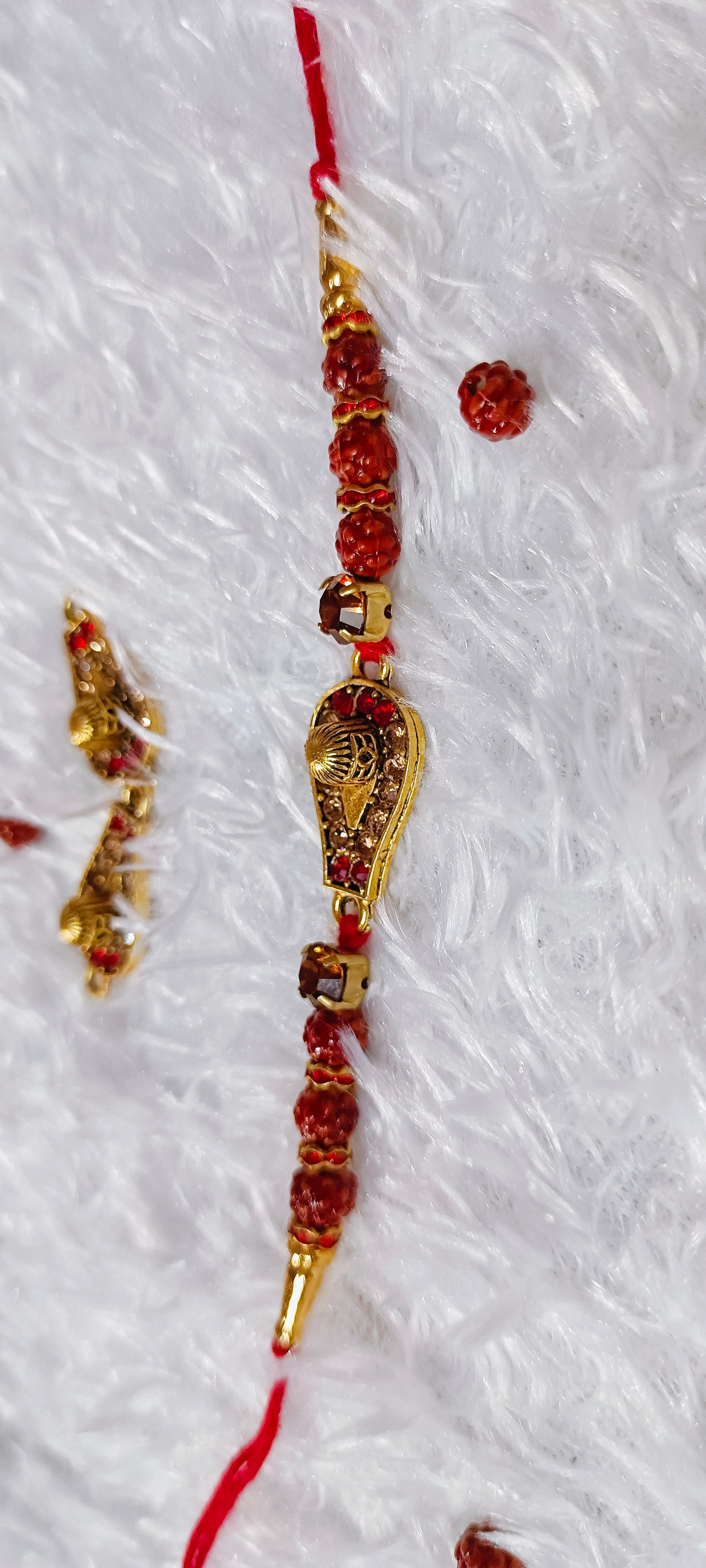 Rakhi beautiful shivling with red Ad stone